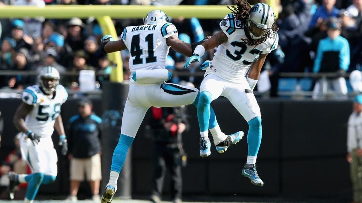 Panthers celebrating first downs? No problem. But don’t do it if you’re on the other team or risk Roman Harper (41) and Tre Boston (33) in your face.