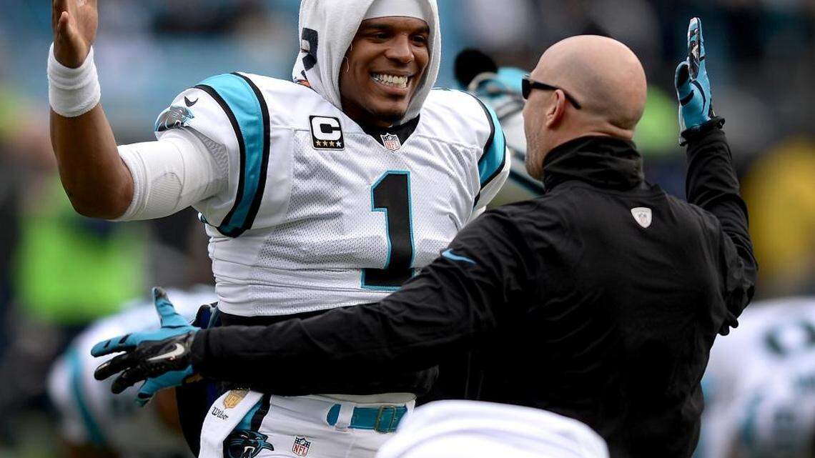 Carolina Panthers quarterback Cam Newton, left, made a playful plea to be on the hands team in his postgame news conference.