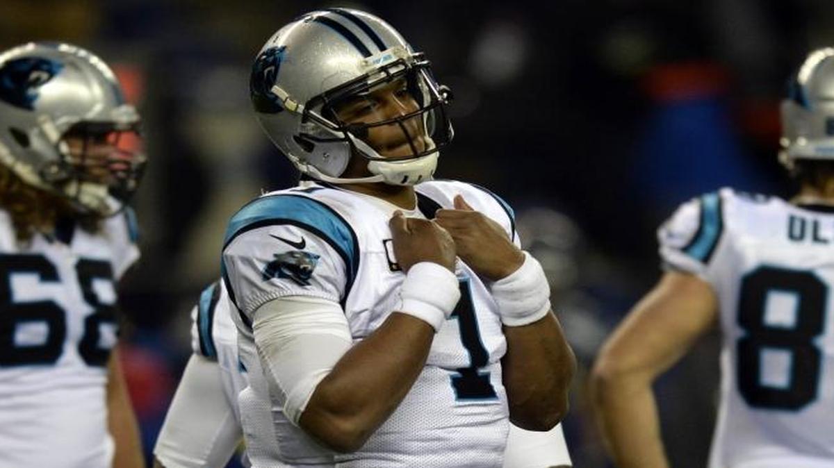 Carolina Panthers quarterback Cam Newton (1) only missed one play after a dress code violation, but that absence has caused a stir – and coach Ron Rivera says he knew it would.