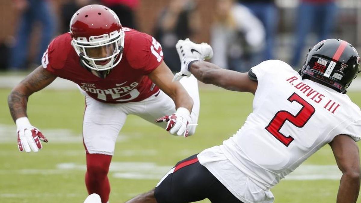 Oklahoma cornerback Zack Sanchez (15), drafted Saturday by the Panthers, breaks up a pass last October. Sanchez was the third cornerback drafted by the Panthers in two days.