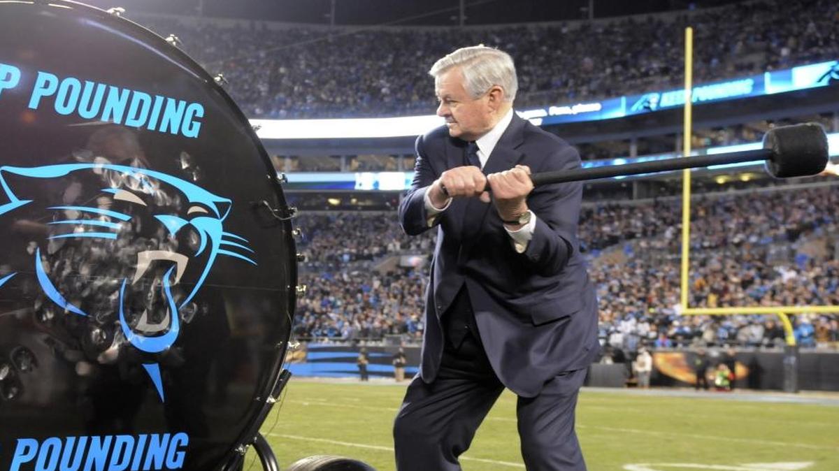 Carolina Panthers owner Jerry Richardson hits the Keep Pounding drum before the NFC Championship game against the Arizona Cardinals on Jan. 24.