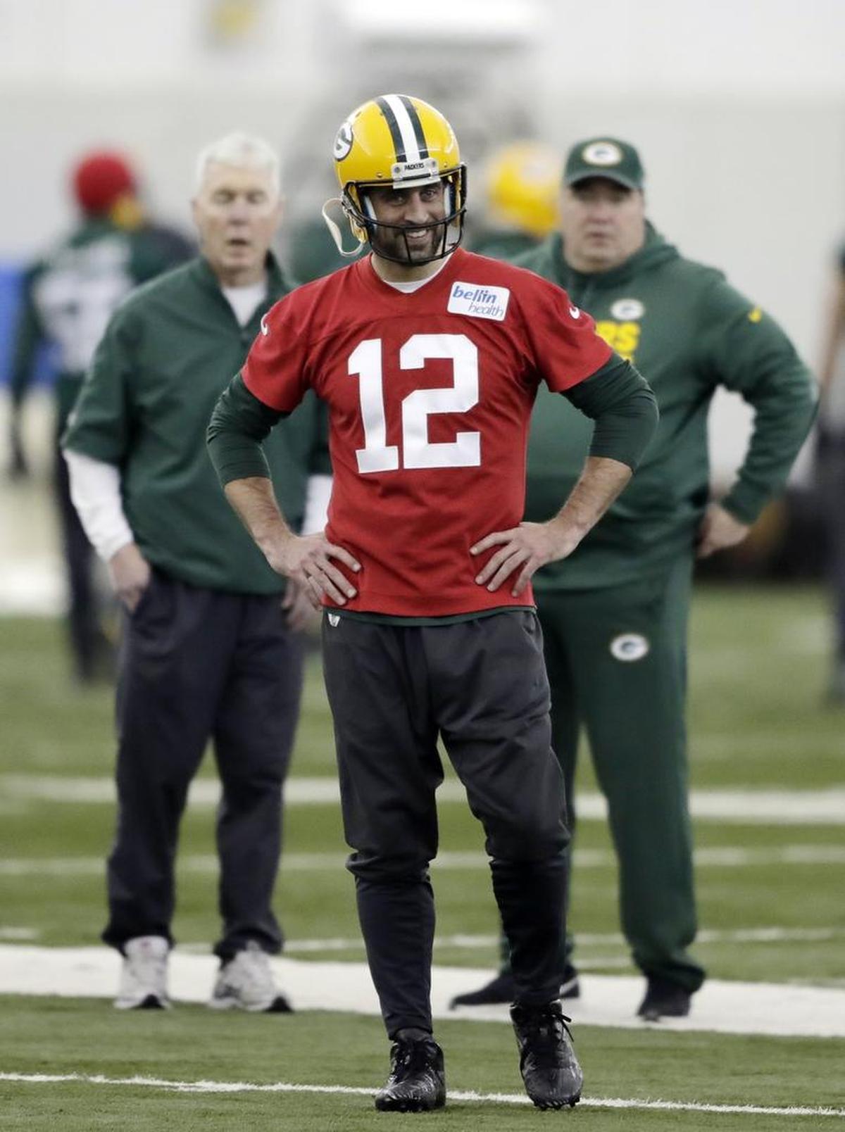 Green Bay Packers quarterback Aaron Rodgers (12) was practicing Wednesday and will play on Sunday after suffering a broken collarbone nine weeks earlier.