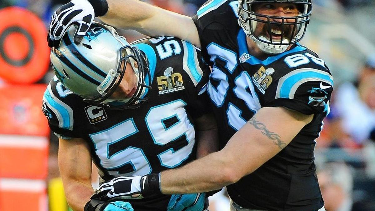 Carolina Panthers defensive end Jared Allen, right, congratulates linebacker Luke Kuechly after Kuechly’s tackle on Denver Broncos quarterback Peyton Manning during the first quarter of Super Bowl 50 at Levi’s Stadium in Santa Clara, Calif., on Feb. 7. Allen announced his retirement from football via Twitter on Thursday.