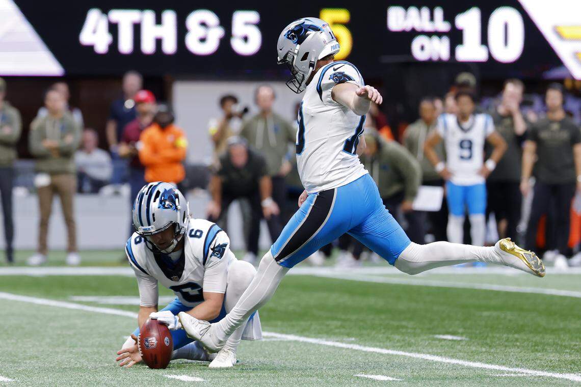 Ryan Fitzgerald of the Carolina Panthers kicks the winning field goal in overtime against the Atlanta Falcons during a 2025 game at Mercedes-Benz Stadium in Atlanta.