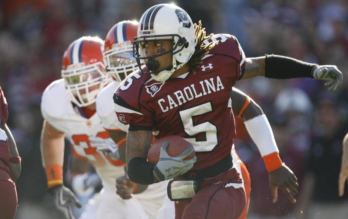 At South Carolina, former Gamecocks coach Steve Spurrier gave Stephon Gilmore (5) a shot at quarterback, but Gilmore was convinced his NFL future was as a defensive back.