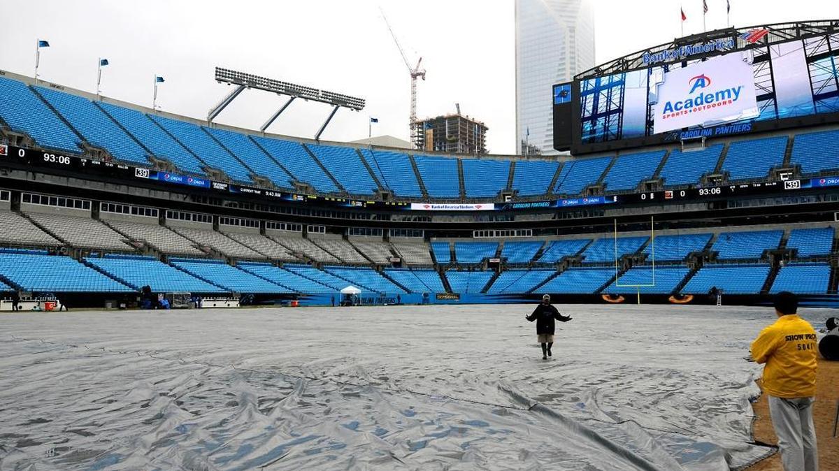 The field at Bank of America Stadium is covered with a tarp before last Sunday’s NFC Divisional playoff between the Carolina Panthers and Seattle Seahawks.