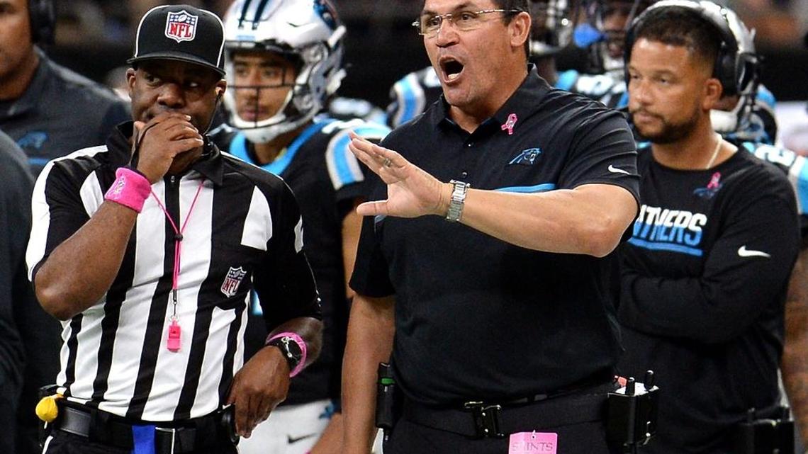 Carolina Panthers head coach Ron Rivera, right, says he wants his players to get away from football during their bye week. The Panthers don’t have a game in Week 7.
