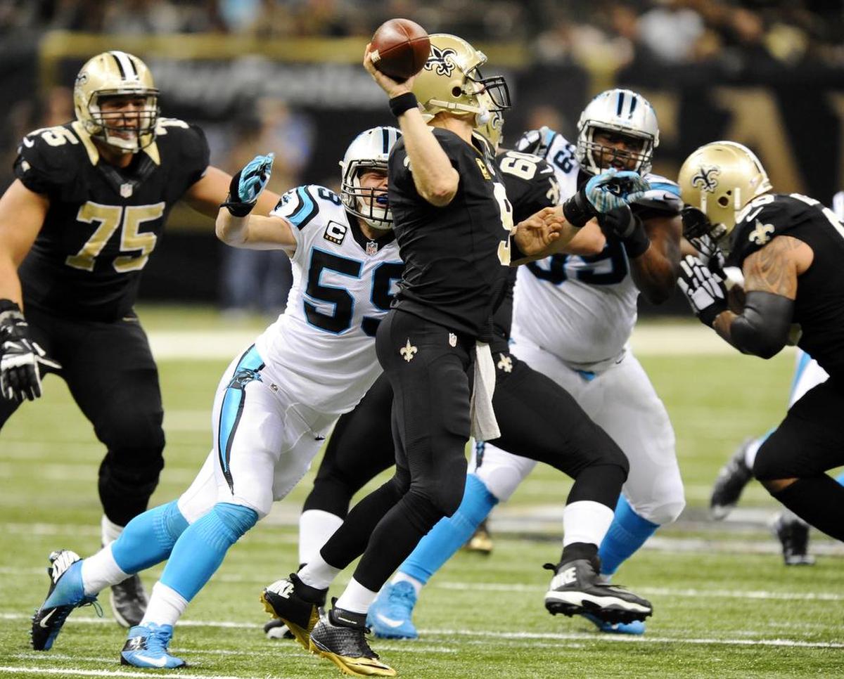 Carolina Panthers' Luke Kuechly (59) pressures New Orleans Saints' Drew Brees (9) in the first half at the Mercedes-Benz Superdome on Sunday, Dec. 6, 2015. The Panthers won 41-38, and improve to 12-0.