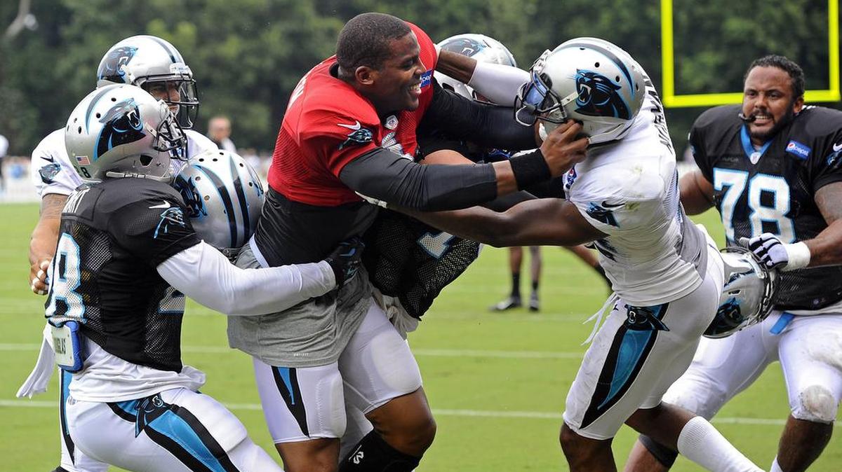 In 2015, Carolina Panthers teammates try to separate quarterback Cam Newton and cornerback Josh Norman during a skirmish at training camp in Spartanburg. While they no longer fight, they’re still competitive against one another. Norman is now in his third season with Washington, which plays host to Newton and the Panthers on Sunday.