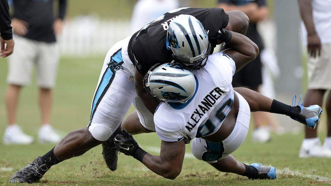 
This pancake block by Carolina Panthers tackle Michael Oher (73) against Frank Alexander (90) during at drill on Monday was part of Oher’s overall good day. 
