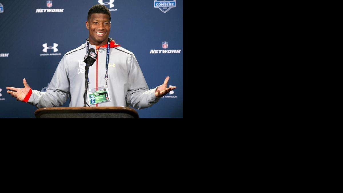 
Florida State quarterback Jameis Winston talks with the media during a news conference at the NFL football scouting combine at Lucas Oil Stadium in Indianapolis, Friday, Feb. 20, 2015.

