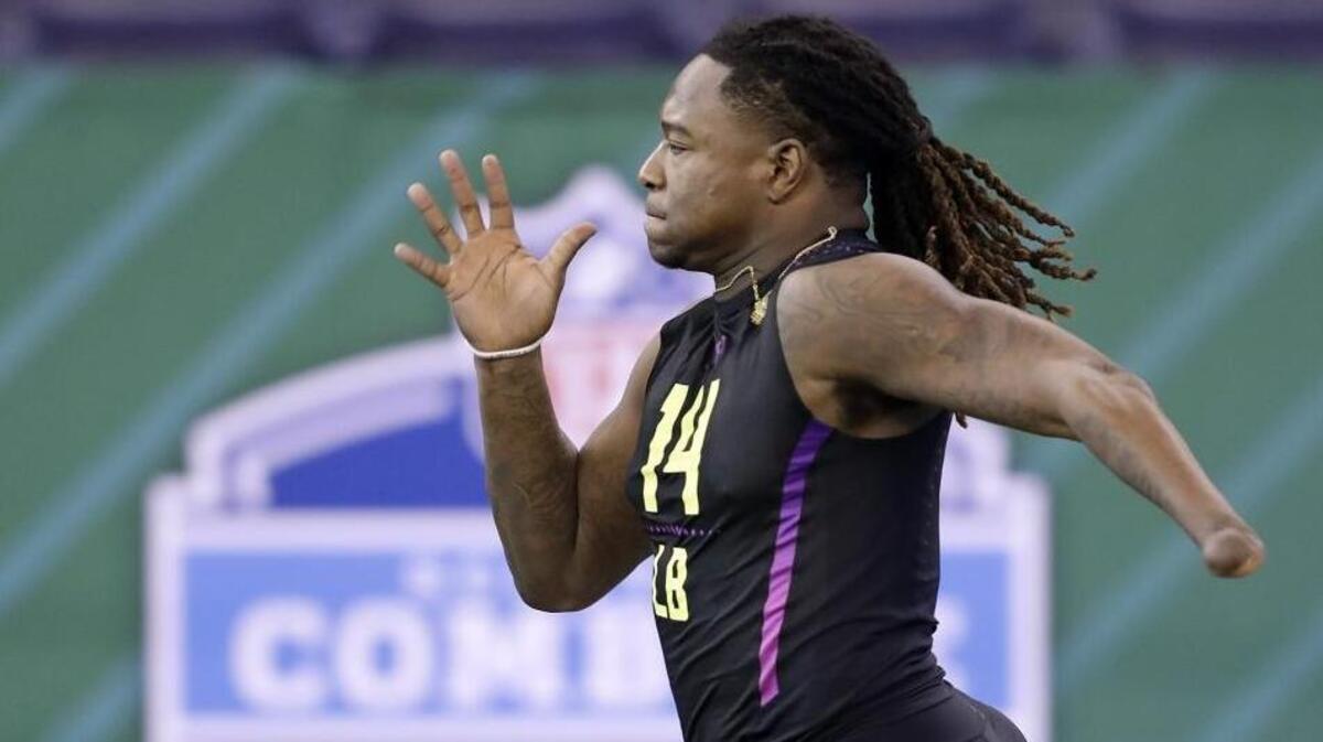 Central Florida linebacker Shaq Griffin runs the 40-yard dash during the NFL football scouting combine, Sunday, March 4, 2018, in Indianapolis. Griffin ran a 4.38, the fastest-recorded for a linebacker at the combine since 2003. (AP Photo/Darron Cummings)