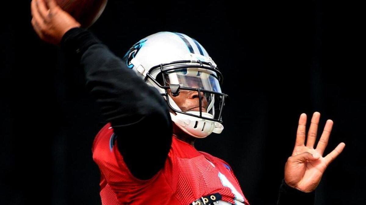 Cam Newton, shown during practice Sunday, will lead the Panthers into Thursday’s season opener, a rematch of Super Bowl 50 against Denver.