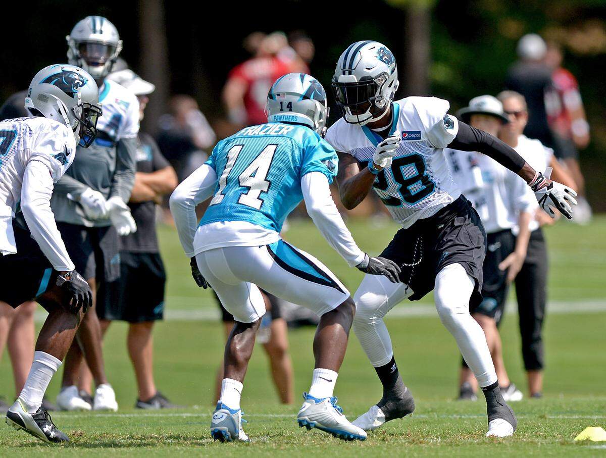 Carolina Panthers safety Rashaan Gaulden, right, runs through a drill with his teammates during practice at Wofford College in Spartanburg, SC.