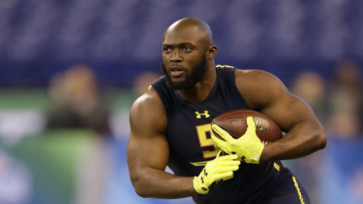 LSU running back Leonard Fournette runs a drill at the NFL football scouting combine in Indianapolis in March.