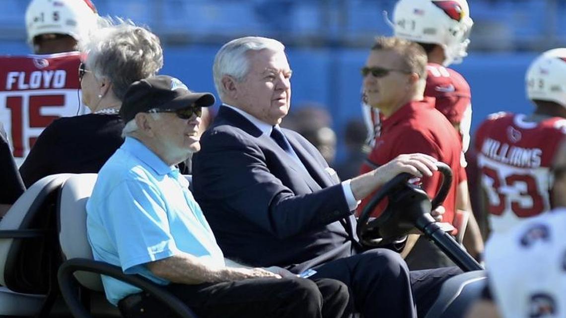 Carolina Panthers owner Jerry Richardson drives with former Bank of America Chairman and CEO Hugh McColl Jr. among the players before a game against the Arizona Cardinals on Oct. 30, 2016. Rumors of the imminent sale of the team were denied by the team on Monday.