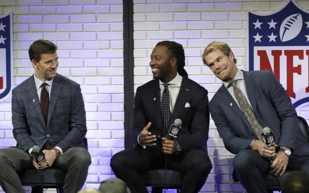 Walter Payton NFL Man of the Year finalists New York Giants' Eli Manning, left, Arizona Cardinals' Larry Fitzgerald, center, and Carolina Panthers' Greg Olsen take part in a fan forum for Super Bowl 51 Friday.