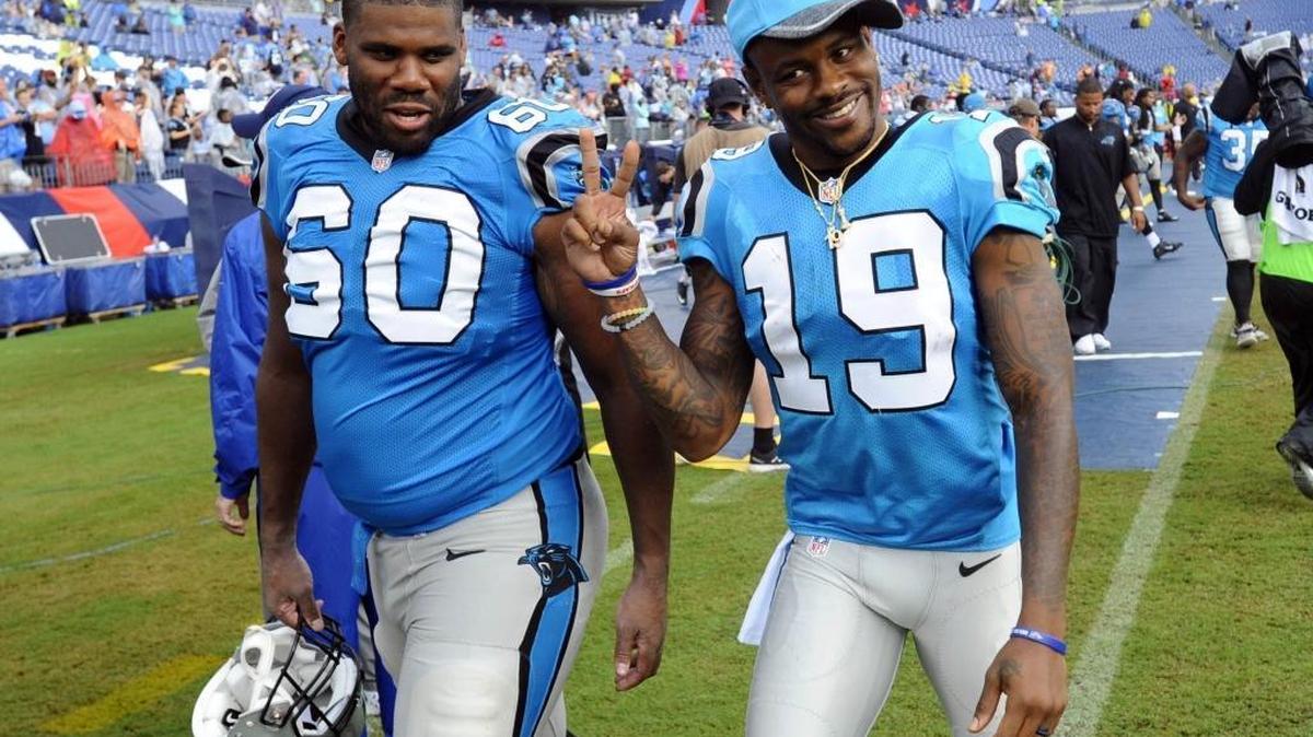Carolina Panthers wide receiver Ted Ginn Jr. (19) and offensive tackle Daryl Williams (60) walk off the field after the game against the Tennessee Titans on Saturday. The backup offensive tackles performed better Saturday, and the Panthers won 26-16.