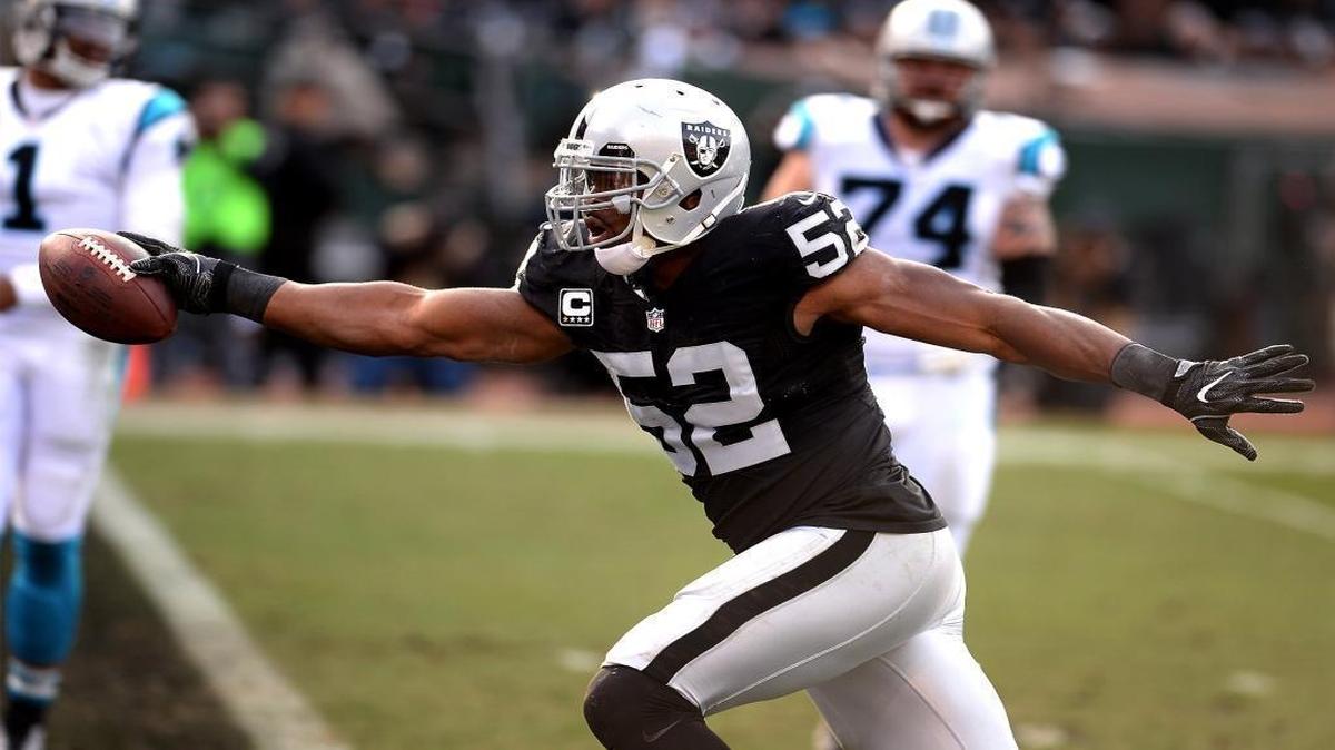 Oakland Raiders defensive end Khalil Mack crosses the goal line for a touchdown after intercepting a pass from Carolina Panthers quarterback Cam Newton during the second quarter of Sunday’s game. The Panthers fell, 35-32, at Oakland.
