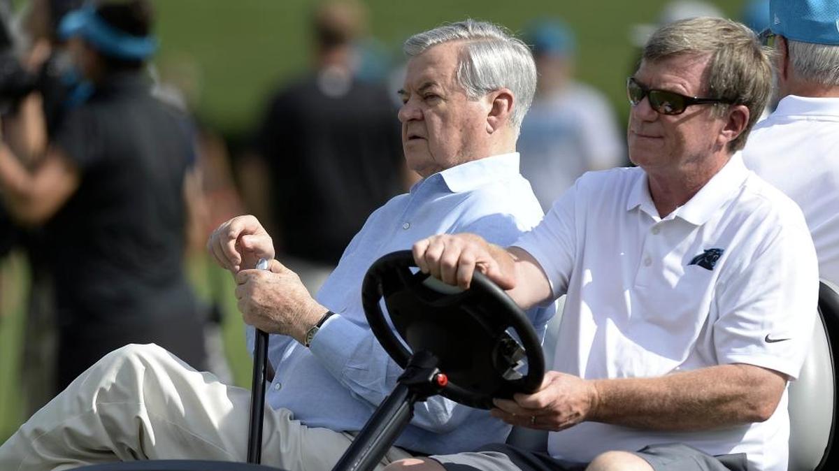 Panthers interim general manager Marty Hurney, right, became emotional Monday when discussing owner Jerry Richardson, left. Hurney said he enjoys what he’s doing and hopes to get the job full-time.