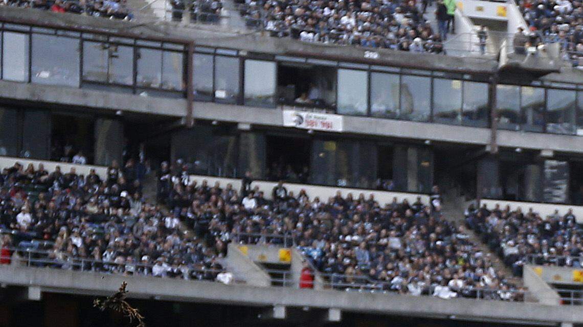 Carolina Panthers quarterback Cam Newton (1) scores a touchdown against the Oakland Raiders during the first half of an NFL football game in Oakland, Calif., Sunday, Nov. 27, 2016. (AP Photo/Tony Avelar)