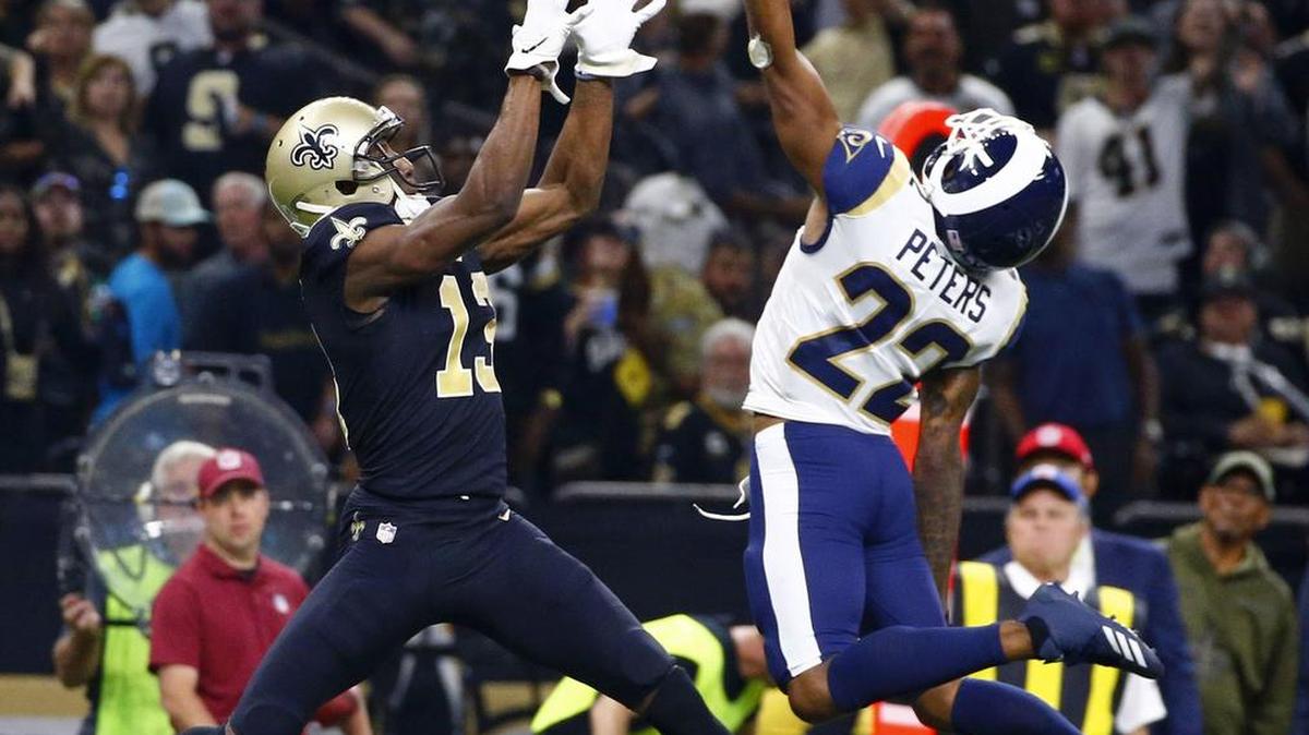 The New Orleans Saints and receiver Michael Thomas (13) will host the NFC championship game Sunday against the Los Angeles Rams and Marcus Peters (22).