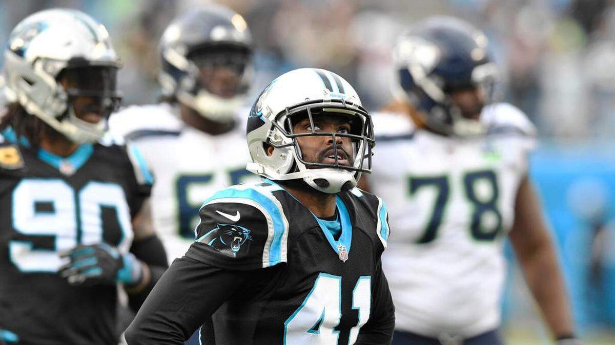 Carolina Panthers defensive back Captain Munnerlyn (41) looks up at the video scene to watch the replay of a 43-yard pass play to put the Seattle Seahawks at the Panthers 10-yard line late in the game at Bank of America Stadium on Sunday, November 25, 2018. Seattle won 30-27.