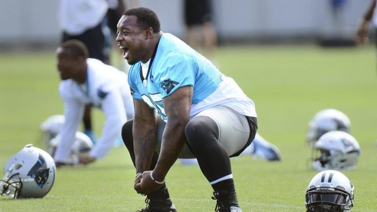 Mike Tolbert, #35, Panthers fullback, screams during stretching exercises at the team's minicamp in 2016. Tolbert now plays for this week’s Panthers’ opponent, the Buffalo Bills.