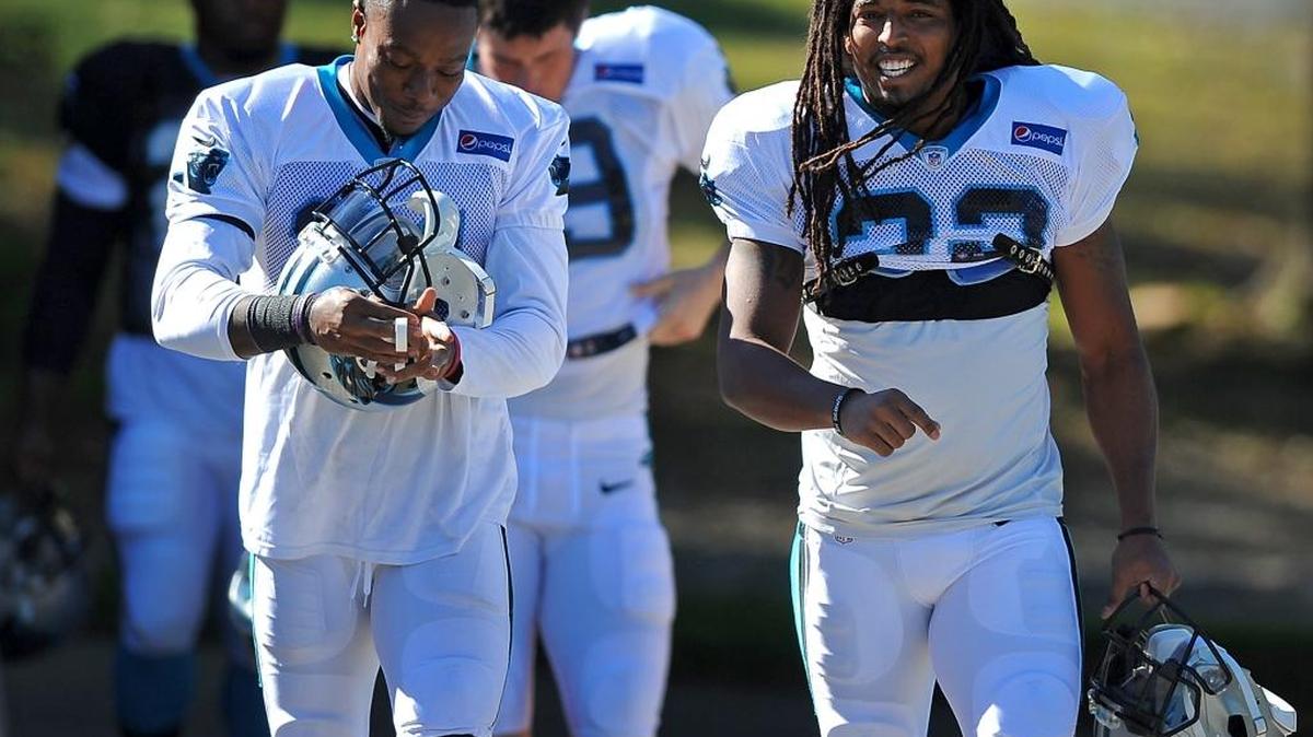 Carolina Panthers safety Tre Boston (right) says North Carolina’s success in football this season has made it easier to be in the locker room.