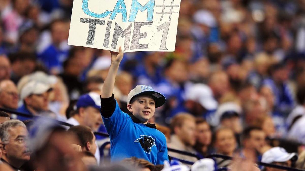 File photo: A young fan shows his support for Carolina Panthers quarterback Cam Newton during action vs the Indianapolis Colts during the teams’ last meeting on Nov. 27, 2011