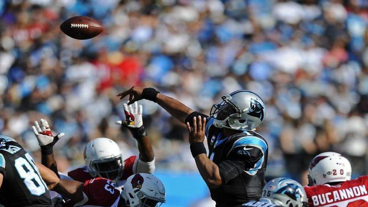In Sunday’s 30-20 win, Carolina Panthers quarterback Cam Newton (1) let the quick passes fly early and often.
