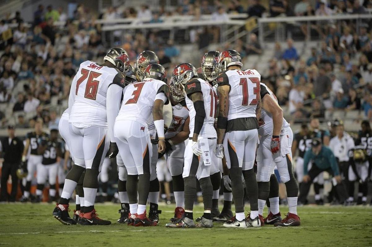 Tampa Bay Buccaneers quarterback Jameis Winston (3) calls a play in the huddle.