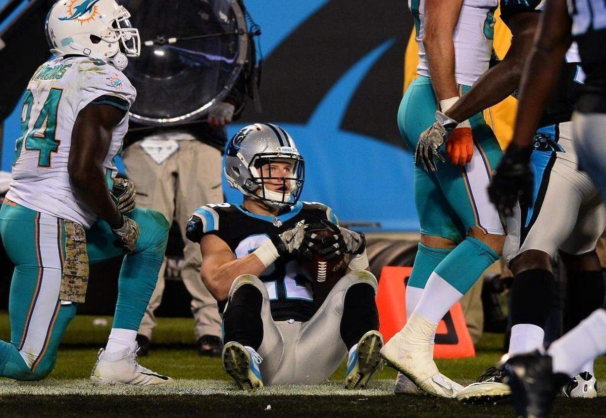 Carolina Panthers running back Christian McCaffrey said as a youth that he played video games as future teammate Jonathan Stewart. Above, the rookie reacts after a touchdown Monday night against the Dolphins.