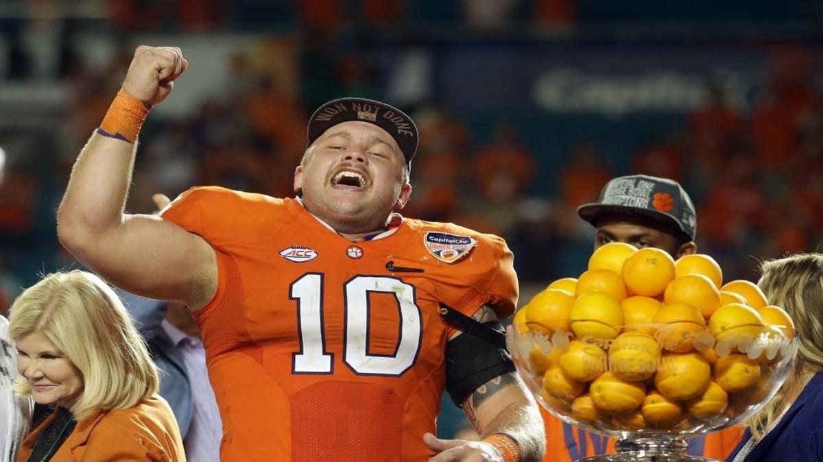 Clemson linebacker Ben Boulware (10) cheers during the award presentation after his team won the Orange Bowl NCAA college football semifinal playoff game against Oklahoma, Thursday, Dec. 31, 2015, in Miami Gardens, Fla. Clemson defeated Oklahoma 37-17.(AP Photo/Lynne Sladky)