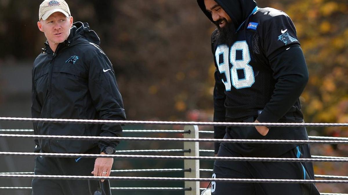 Carolina Panthers defensive coordinator Sean McDermott, left, and defensive tackle Star Lotulelei walk to practice recently.