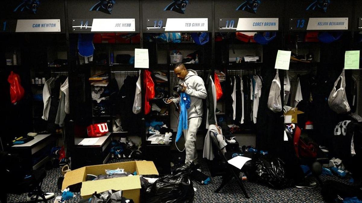 Carolina Panthers wide receiver Ted Ginn Jr. cleans out his locker at Bank of America Stadium on Monday. The Panthers’ season ended Sunday with a 17-16 loss to the Tampa Bay Buccaneers, which dropped Carolina to 6-10.