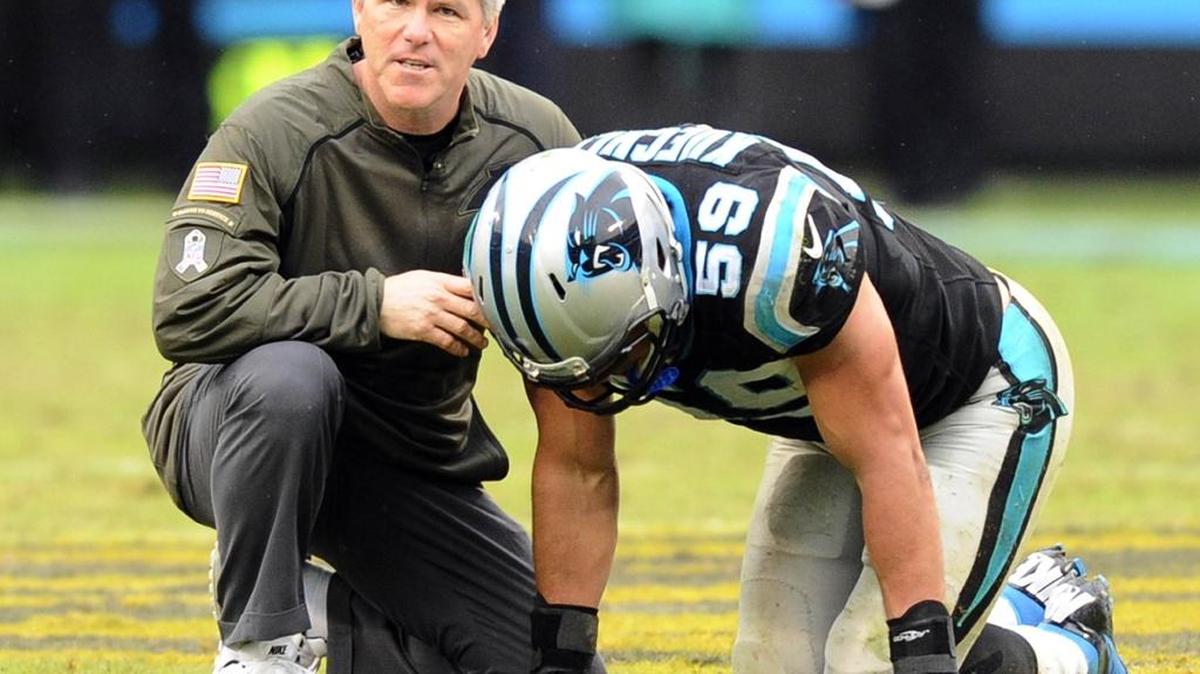 Carolina Panthers linebacker Luke Kuechly (59) twisted his right ankle twice during Sunday’s victory over Green Bay. He returned to the game both times.