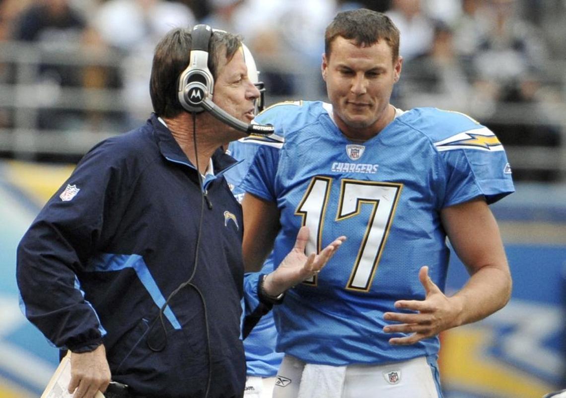 With the San Diego Chargers, Norv Turner, left, challenged quarterback Philip Rivers in the quarterbacks room and on the sideline.