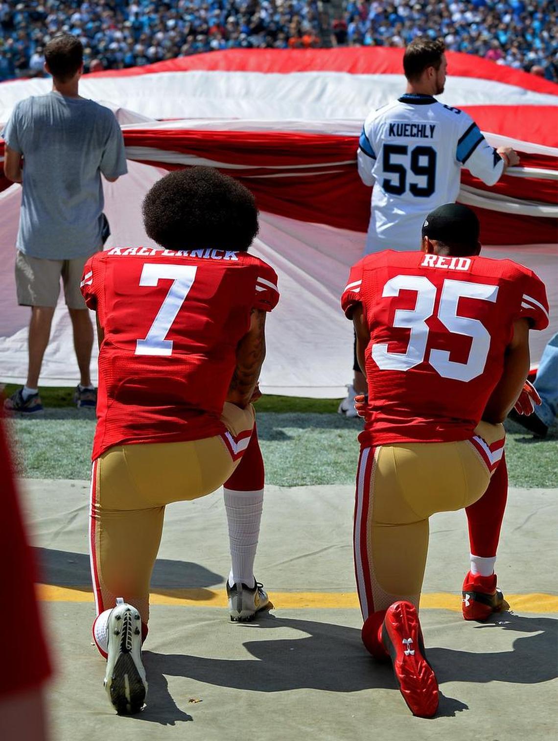 In 2016, San Francisco 49ers quarterback Colin Kaepernick, left and safety Eric Reid (now with the Panthers) kneeled together during the playing of the national anthem in Charlotte before a game with Carolina.