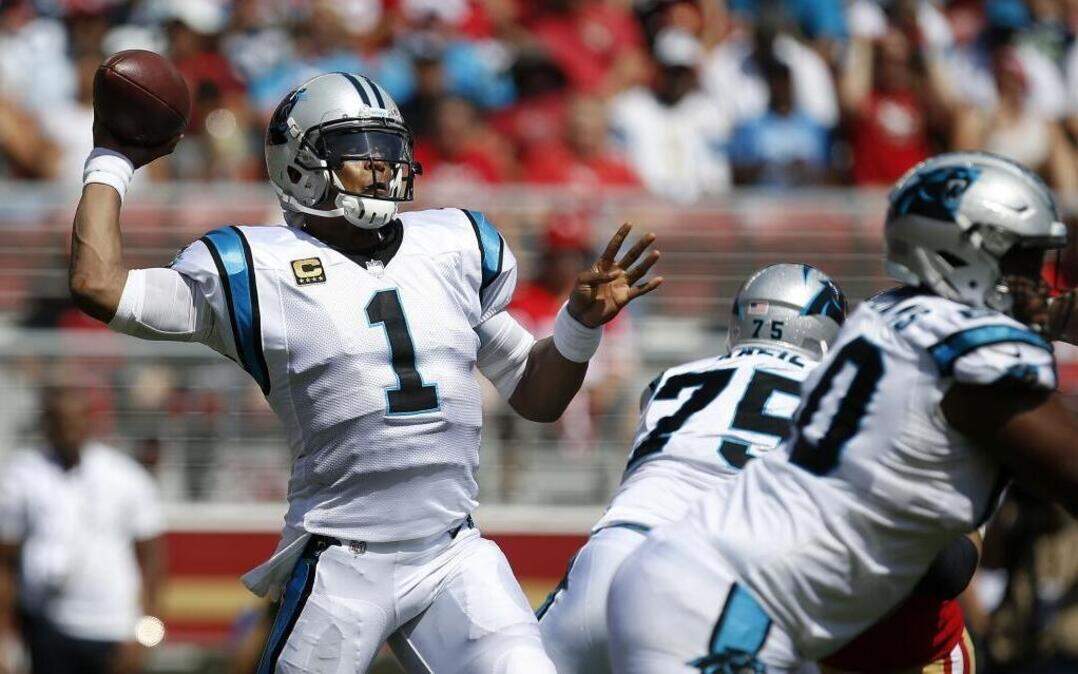 Carolina Panthers quarterback Cam Newton (1) throws a pass against the San Francisco 49ers in Sunday’s game at Santa Clara, Calif.