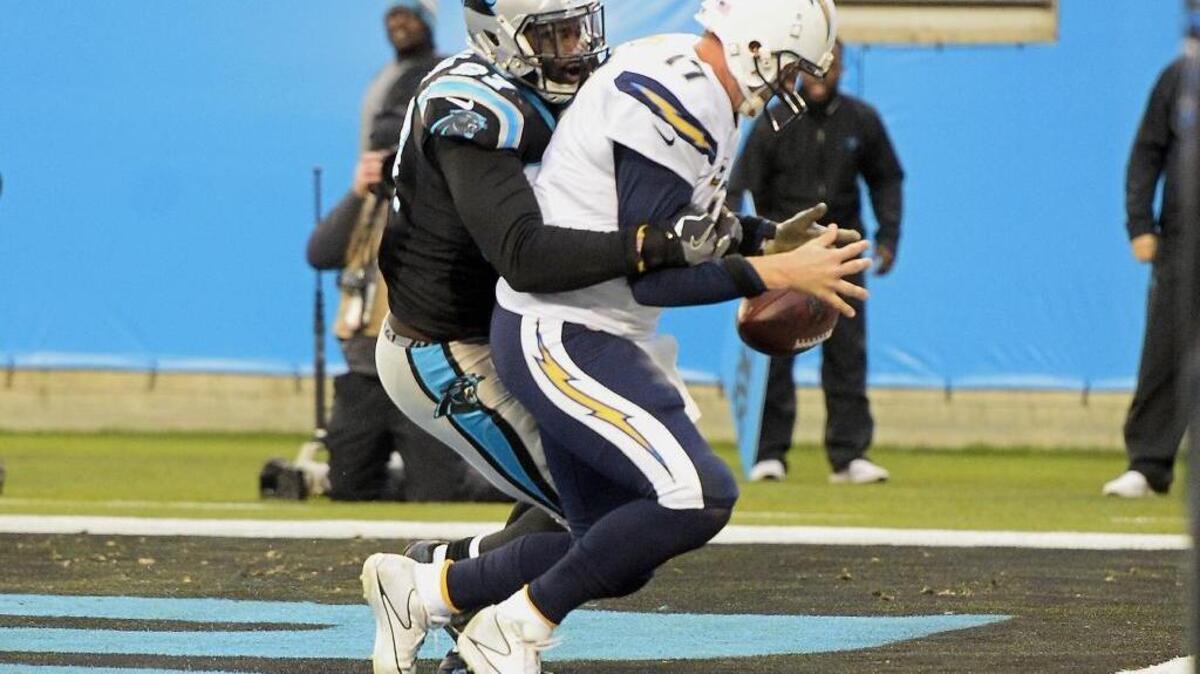 Carolina Panthers defensive end Mario Addison (97) sacks San Diego Chargers quarterback Philip Rivers (17) for a safety on Dec. 11, 2016. The Panthers won 28-16.