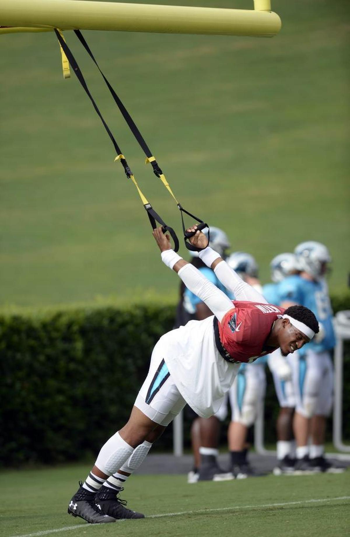 Carolina Panthers quarterback Cam Newton (1) hasn’t done much throwing in camp, but offensive coordinator Mike Shula is stretching what Newton’s offense can do – and says you haven’t seen it all.