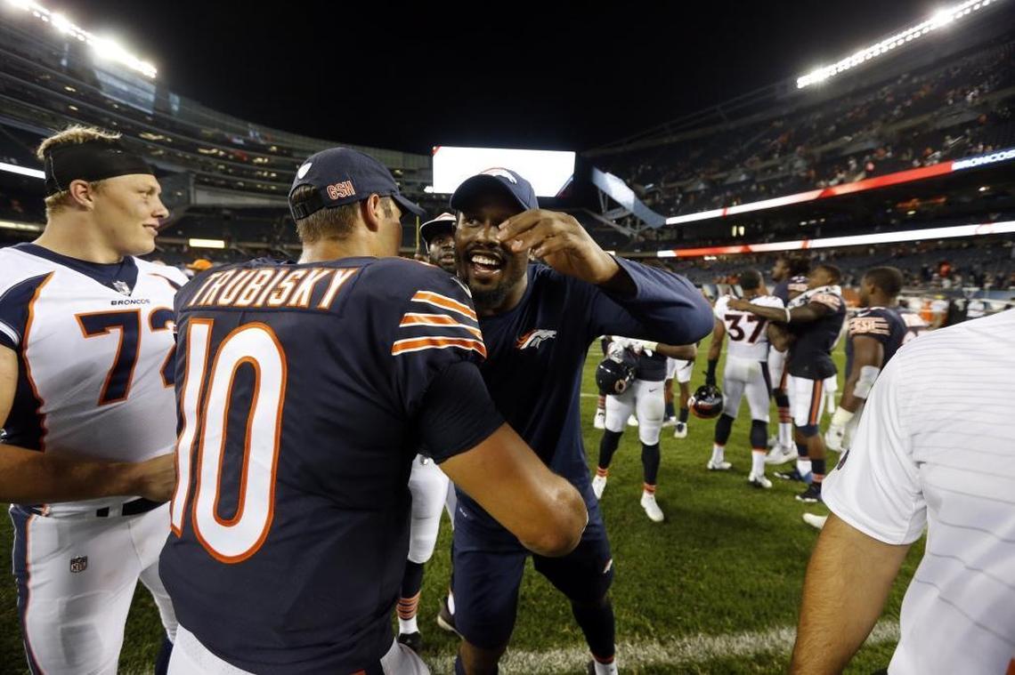 Chicago Bears quarterback Mitchell Trubisky (10) hugs Denver Broncos outside linebacker Von Miller (58) after an NFL preseason football game, Thursday, Aug. 10, 2017, in Chicago. The Broncos won 24-17. (AP Photo/Charles Rex Arbogast)
