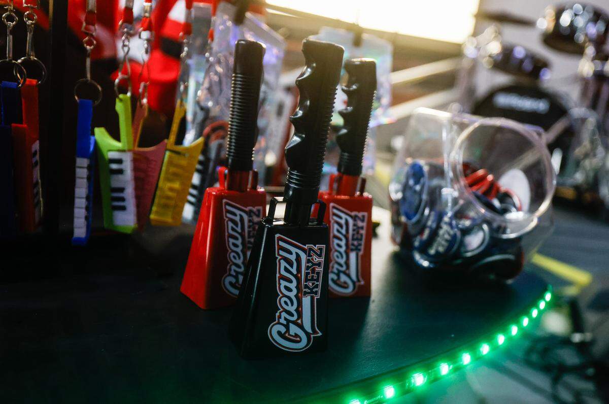 Merchadise for Greazy Keyz sits on a table in the Greaz Pit during the Cadler Cup opener between the Checkers and the Canucks at Bojangles Coliseum in Charlotte, NC on Friday, June 13, 2025.