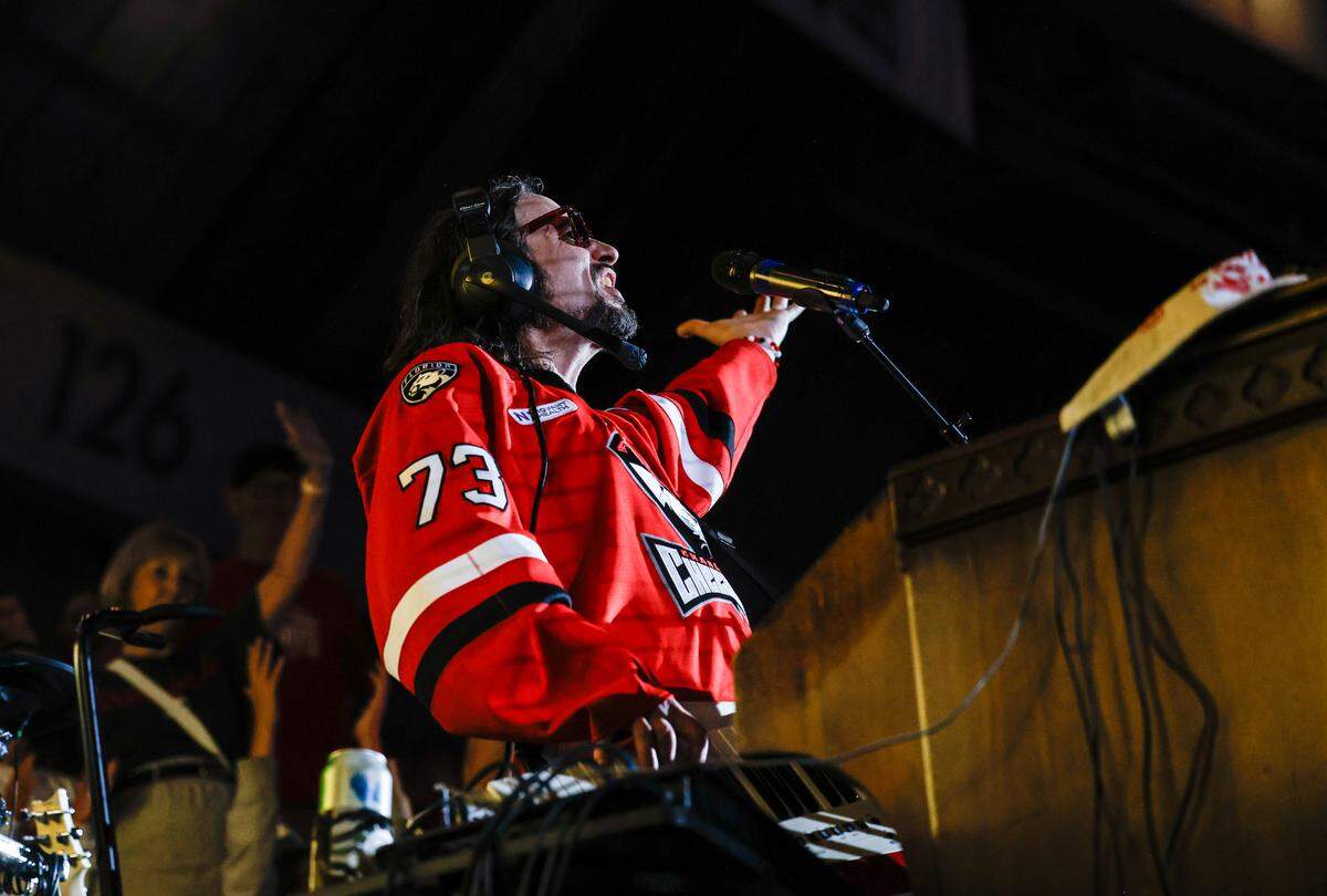 Organist and keytarist Jason Atkins, also known as Greazy Keyz, plays to the crowd during the Calder Cup opener between the Checkers and Canucks at Bojangles Coliseum in Charlotte, NC on Friday, June 13, 2025.