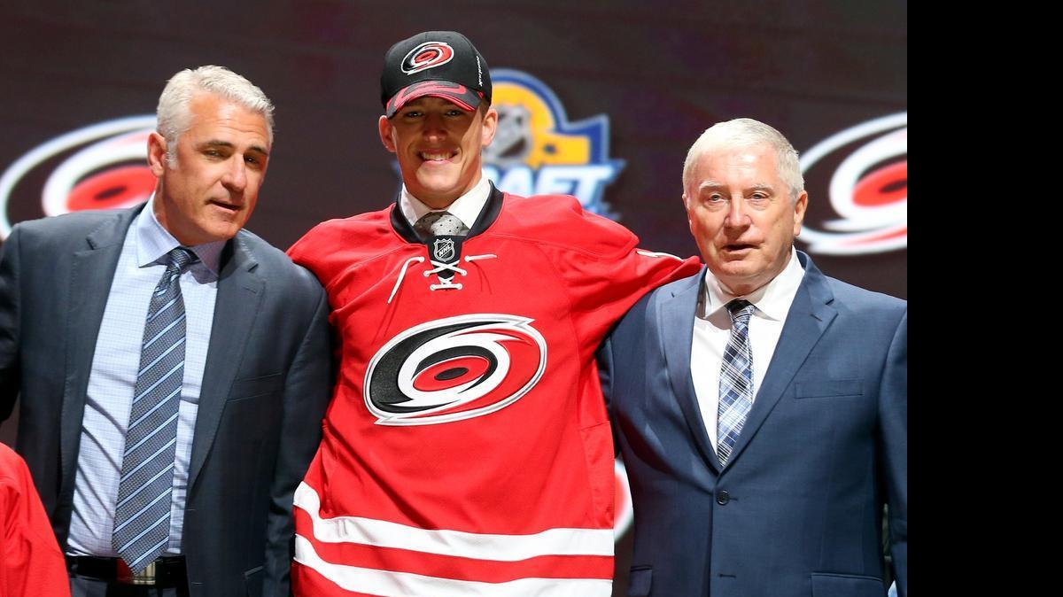 
Noah Hanifin poses after being selected fifth overall by the Carolina Hurricanes in the first round of the 2015 NHL Draft.
