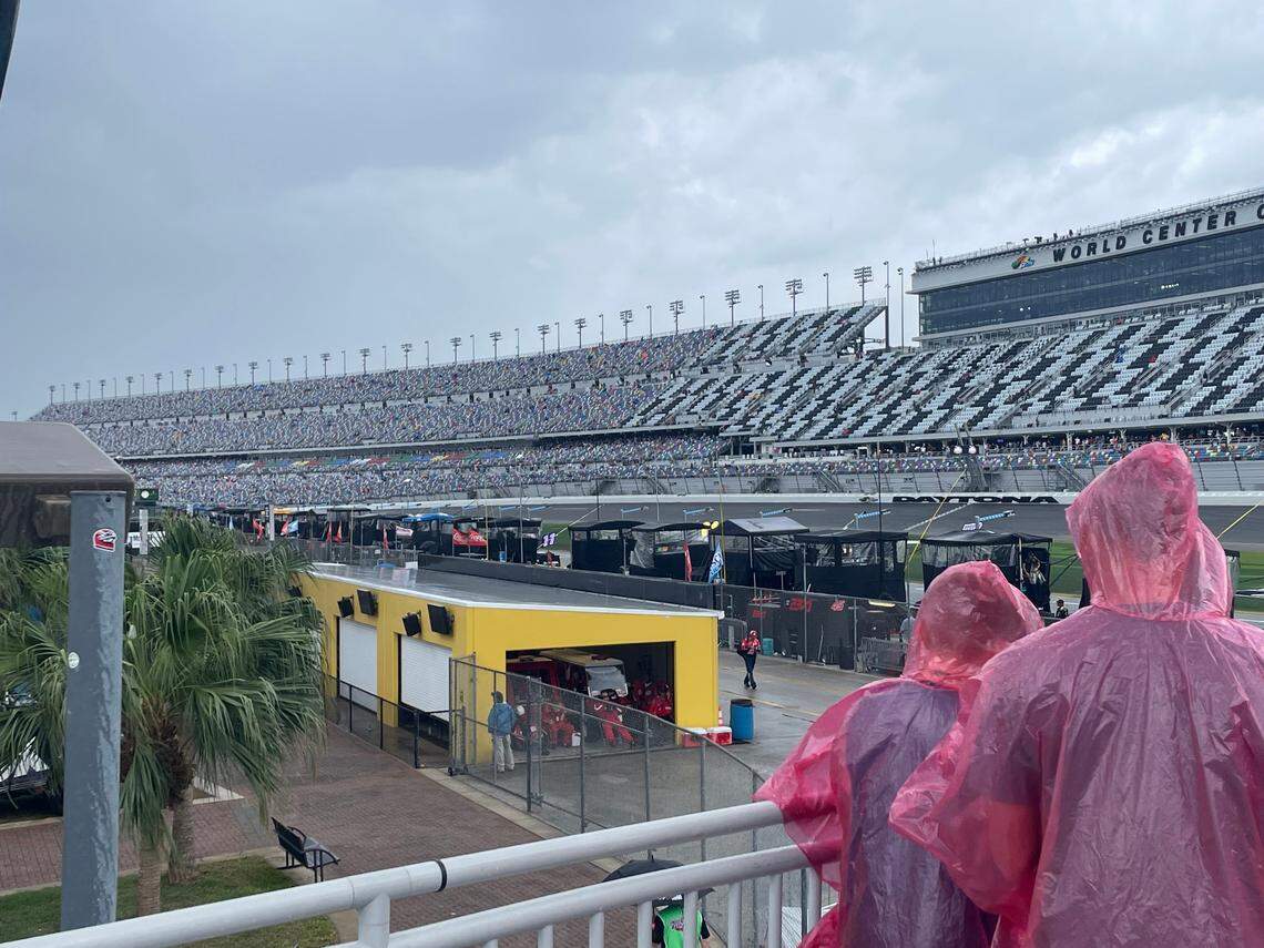 Here’s an overview of pit road, where cars have been covered, at Daytona International Speedway on February 16, 2025, the day of the 67th running of the Daytona 500. Rain and winds have paused the Great American Race.