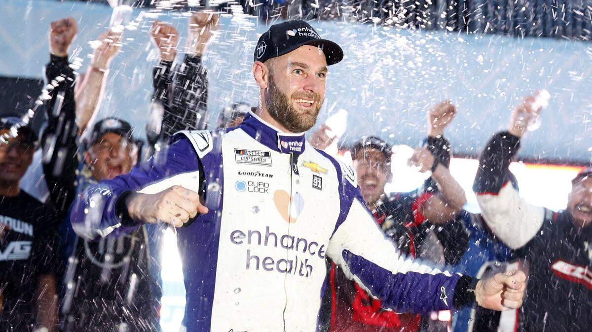 Jul 2, 2023; Chicago, Illinois, USA; NASCAR Cup Series driver Shane Van Gisbergen (91) reacts after winning the Grant Park 220 of the Chicago Street Race at Chicago Street Race. Mandatory Credit: Mike Dinovo-USA TODAY Sports