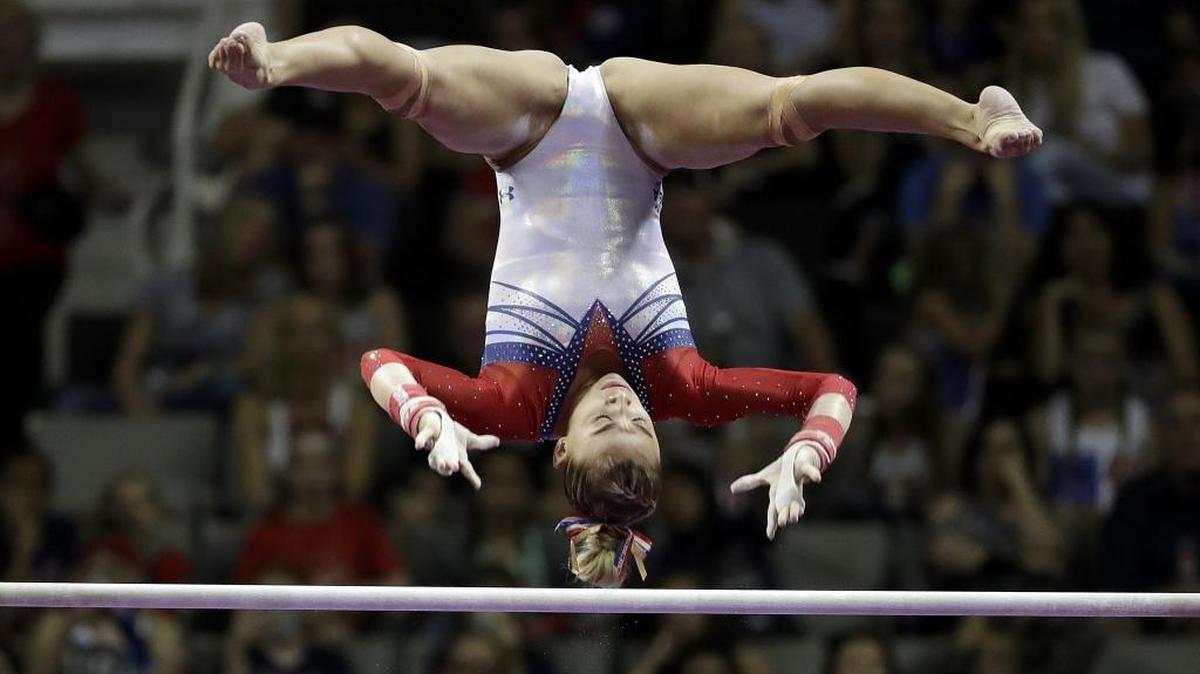 Ashton Locklear competes on the uneven bars during the women's U.S. Olympic gymnastics trials in San Jose, Calif., Sunday, July 10, 2016.