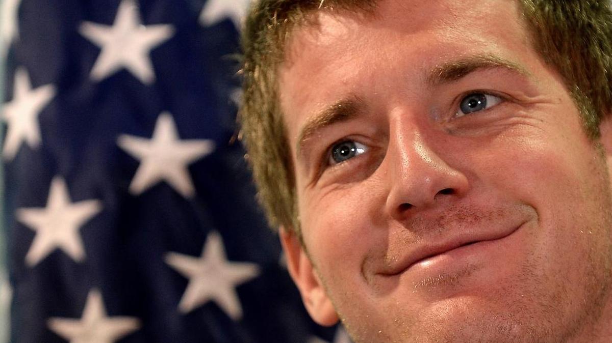 2016 U.S. Olympic men's swim team member Jimmy Feigen remains in Brazil after a judge ordered his passport seized over questions about an alleged armed robbery at the Olympic Games.